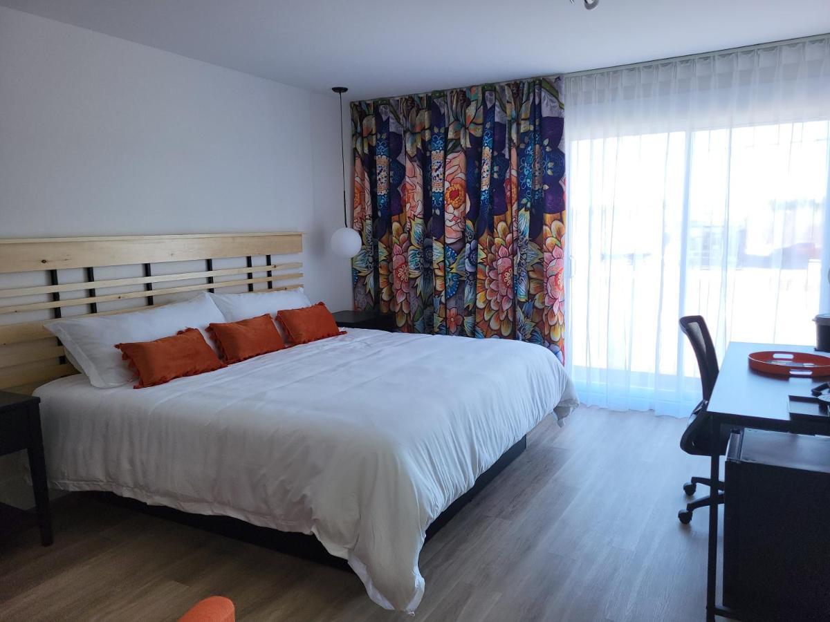Motel Au Rocher Du Cap Cap-Saint-Ignace Bagian luar foto
